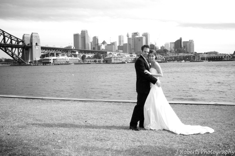 Bride and groom with Sydney harbour in background - wedding photography